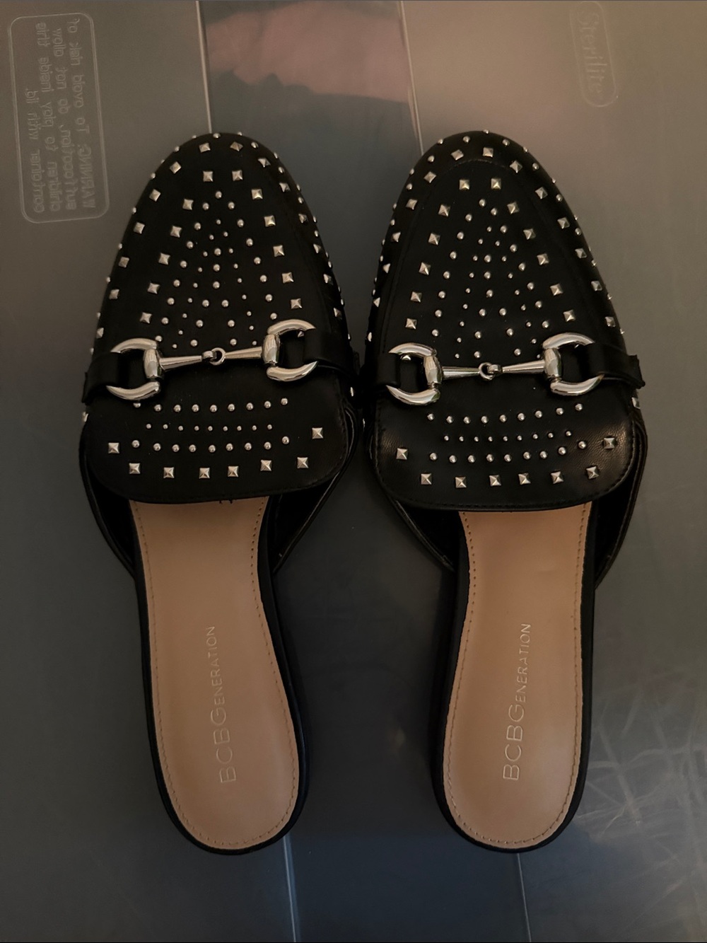 BCBGeneration Black Studded Slip-On Mules with Silver Hardware